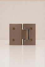 XO 180° Glass-to-Glass Hinge, Antique Brass — back